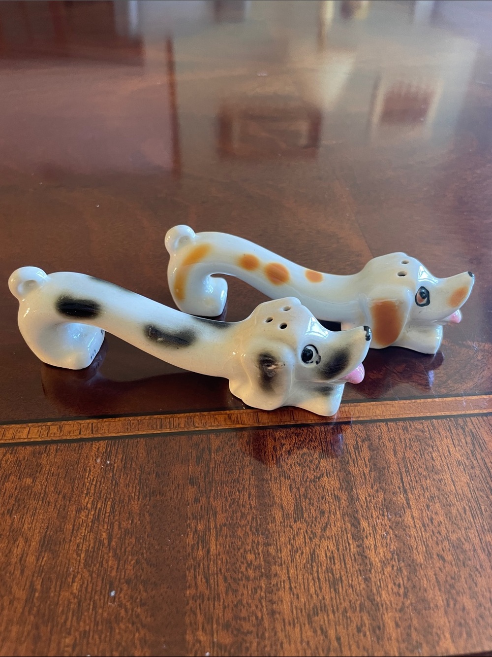 Vintage Ceramic dachshund salt and pepper shakers.